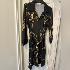 Black and gold chain wraps dress from Cleo.